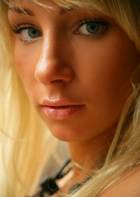 Excellent blond teen Dasha A showing small tits and shaved pussy 